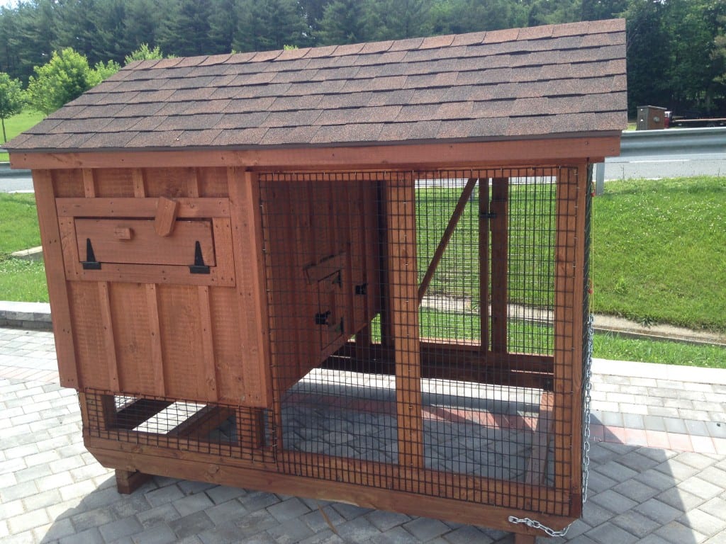 Frame chicken coop combination with a chicken coop area with ...