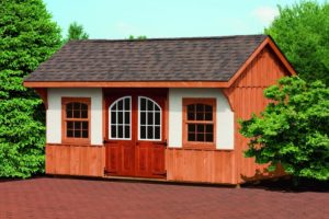 10x16 quaker deluxe storage shed with pine board and batten stained soy cecar with stained trim, and dual brown shingles, also ha optional 5' fiberglass door stained old heritage mahogany with carriage windows and long hinges, carriage 12 lite windows and tan stucco on balance of front