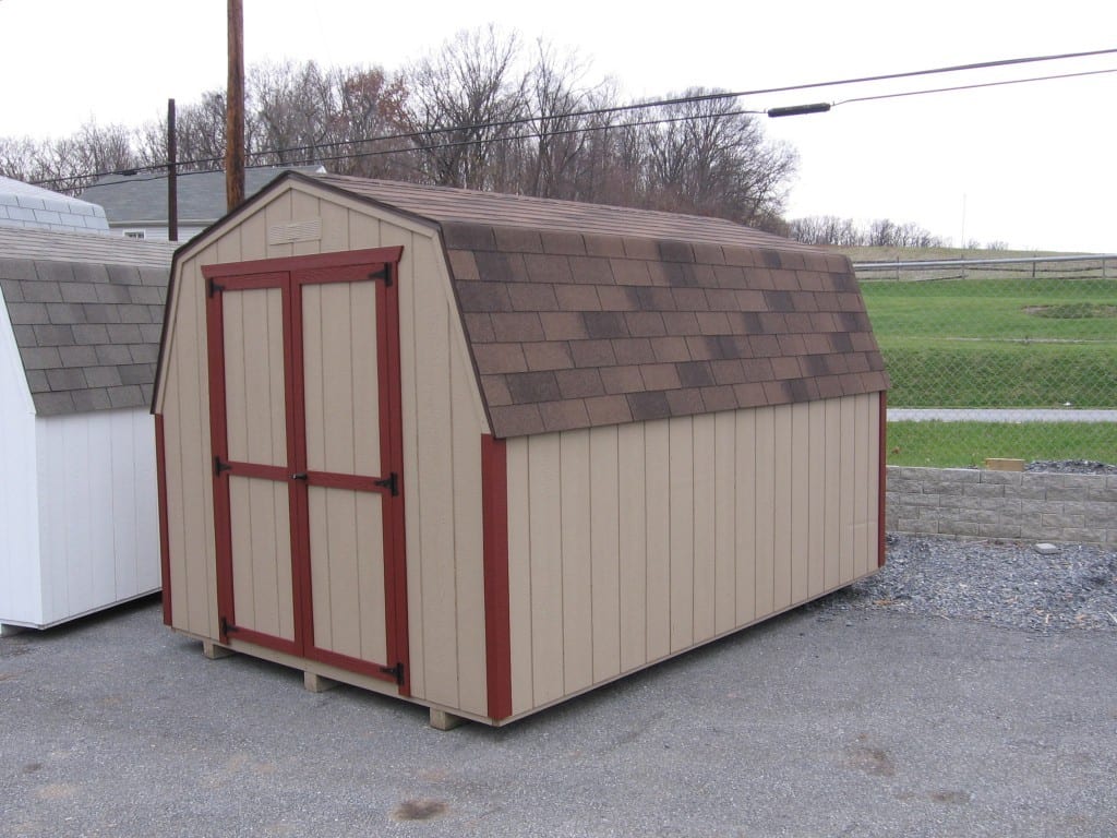 8x10 cheap utility shed - economy mini barn with duratemp walls, asphalt shingles and buckskin painted walls and red trim delivered to MD VA WV.