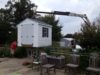 a-frame-vinyl-storage-shed-removed-with-crane-truck