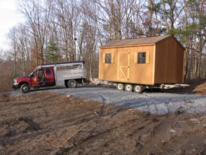 Storage shed relocation with truck and trailer in Maryland