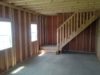 stairs-leading-to-second-story-of-modular-garage-barn