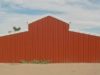 large-red-steel-barn